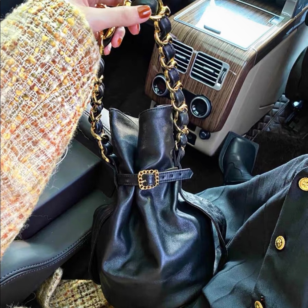 Chanel vintage leather bucket bag with gold chain